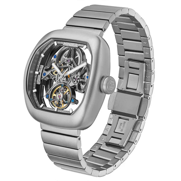 Luxury skeleton watch with silver case, exposed mechanical movement, and sporty metal bracelet — inspired by high-performance racing timepieces.