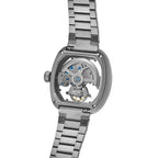 Luxury skeleton watch with exposed mechanical movement, stainless steel case and bracelet, motorsport-inspired design