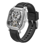 Luxury skeleton watch with exposed tourbillon, carbon fiber case, and black rubber strap — motorsport-inspired design