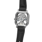 Luxury skeleton watch with exposed mechanical movement, carbon fiber case, and bold sport-luxury design inspired by motorsport.