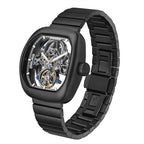 Black skeleton watch with exposed mechanical movement, bold sport-luxury design inspired by motorsport performance