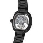 Black skeleton watch with visible automatic movement, motorsport-inspired design, bold luxury style