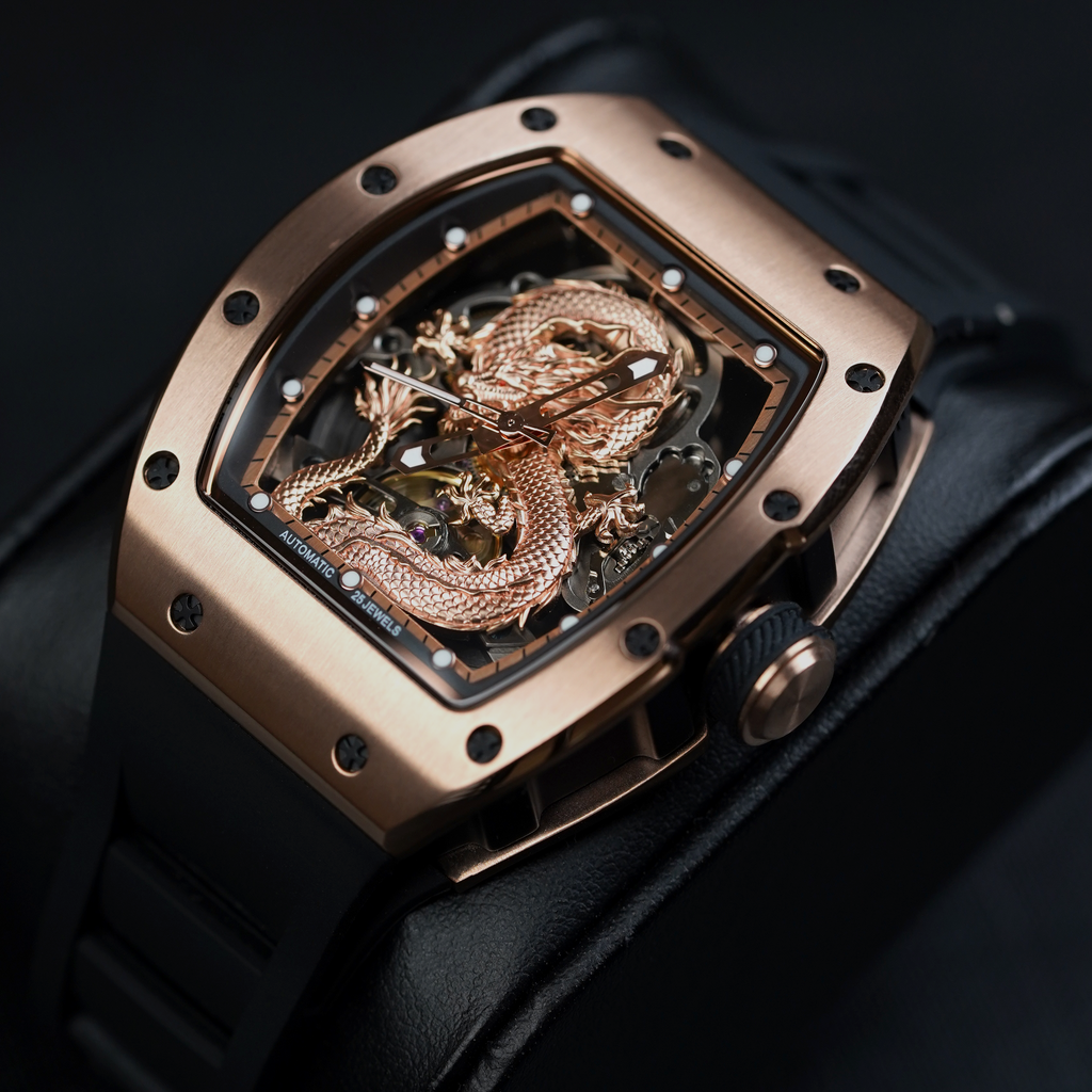 Luxury skeleton sport watch with rose gold case, dragon motif, black rubber strap, bold design