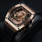 Luxury skeleton sport watch with rose gold case, dragon motif, black rubber strap, bold design