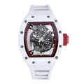 White tonneau-shaped skeleton watch with red crown, motorsport-inspired luxury design
