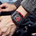 Motorsport-inspired luxury watch with red accents and skeleton dial on wrist