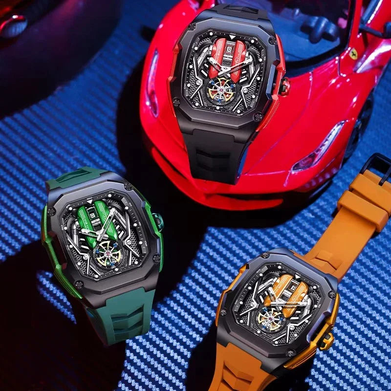 Three motorsport-inspired sport-luxury watches with bold skeleton dials and colored straps, displayed on a carbon fiber surface next to a red sports car model.
