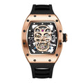 Luxury skeleton watch with gold skull dial, tonneau rose gold case, black rubber strap