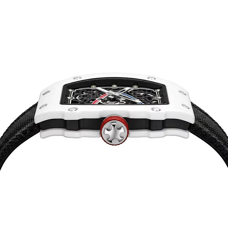 White carbon fiber racing watch with skeleton dial, red crown, and black strap — motorsport-inspired luxury timepiece