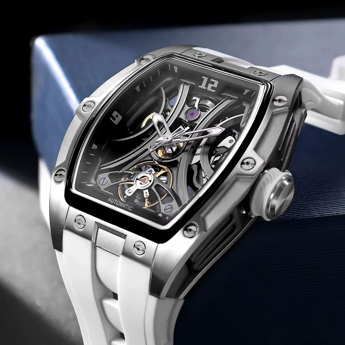 Luxury skeleton automatic watch with tonneau case, white strap, and motorsport-inspired design