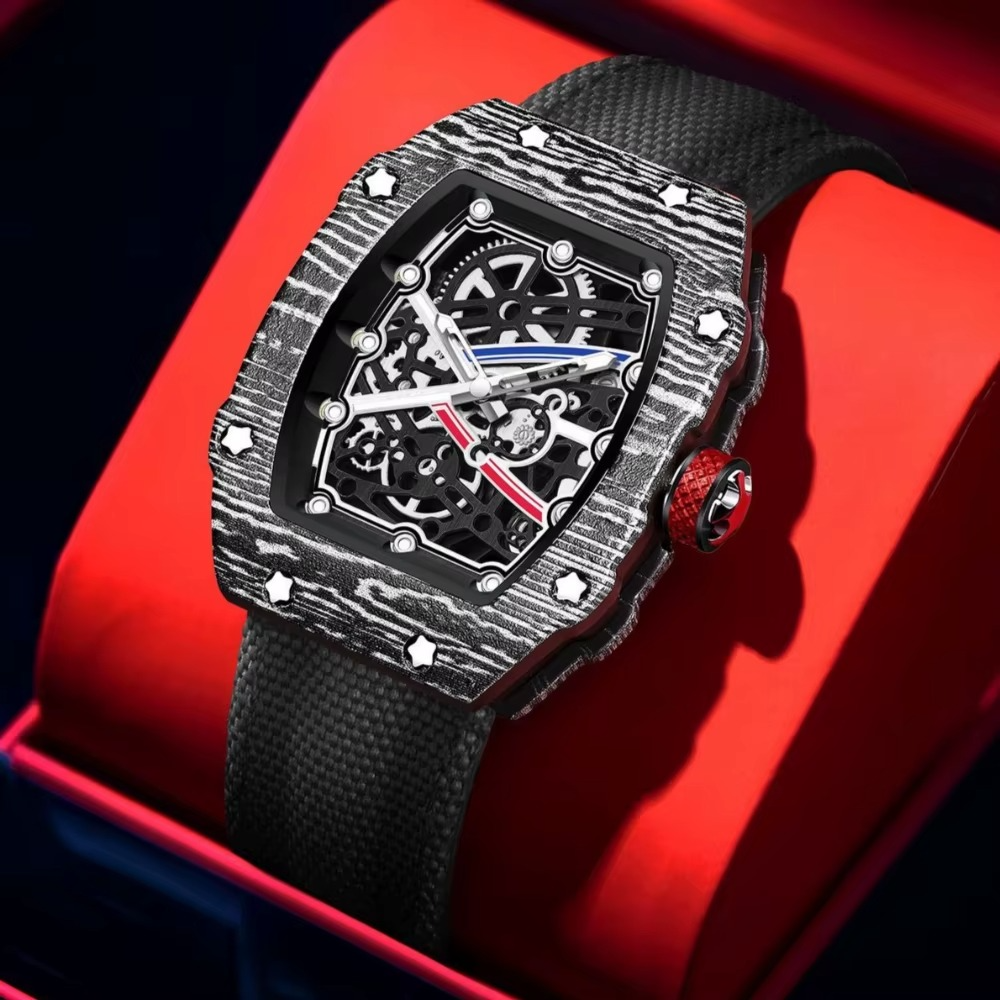 Luxury skeleton watch with carbon fiber case, bold motorsport design, and red accents on black strap