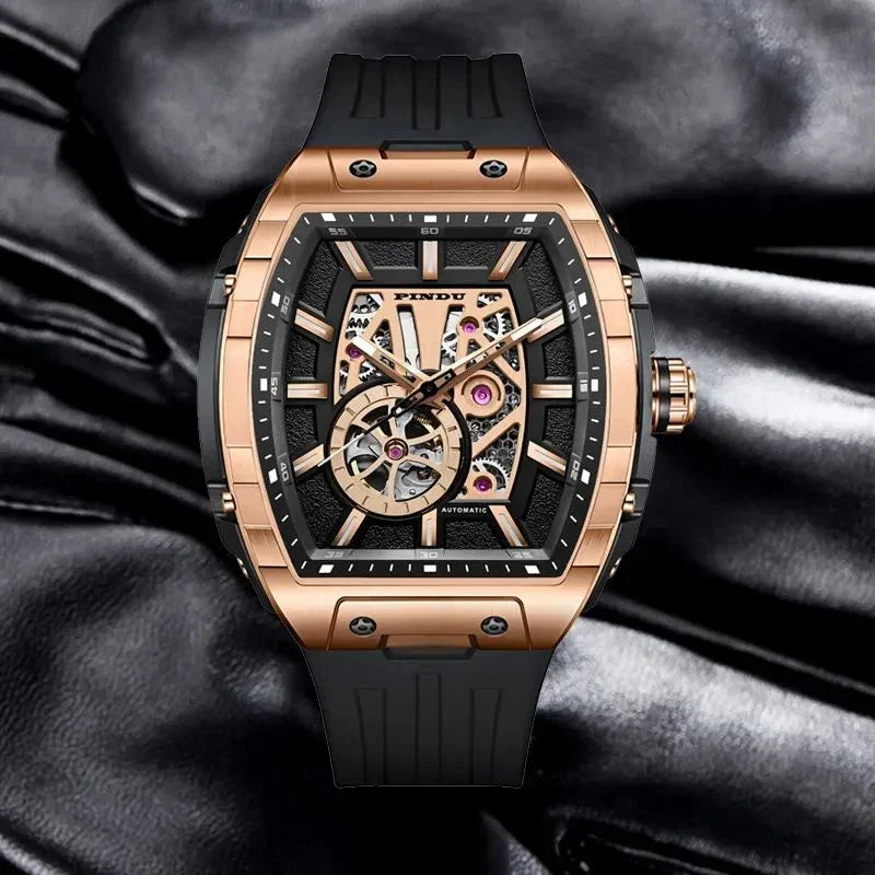 Luxury rose gold skeleton watch with black rubber strap and motorsport-inspired design