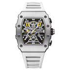 Luxury sport-luxury chronograph watch with white strap, bold skeleton dial, and yellow accents