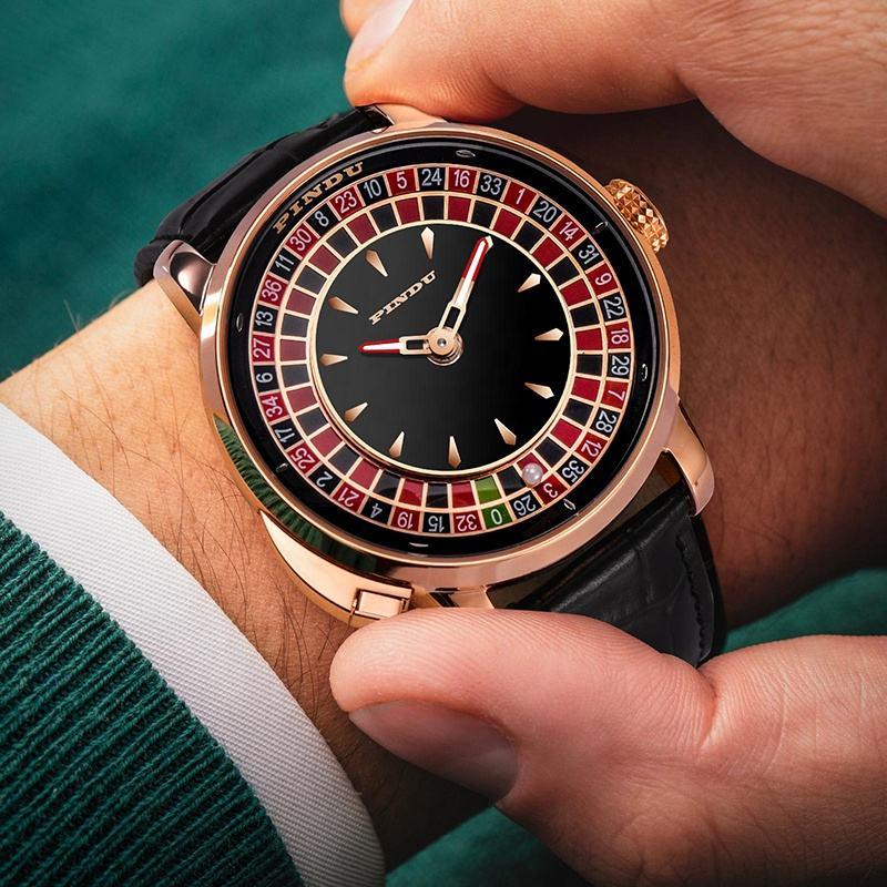 Luxury sport-luxury wristwatch with roulette-inspired dial, gold case, and black leather strap