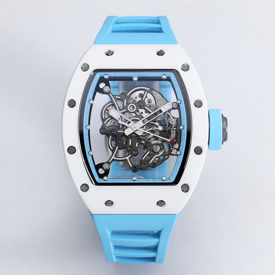 Motorsport-inspired skeleton watch with white case, blue strap, and visible mechanical movement