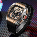 Luxury racing-inspired chronograph watch with skeleton dial, rose gold bezel, and black rubber strap