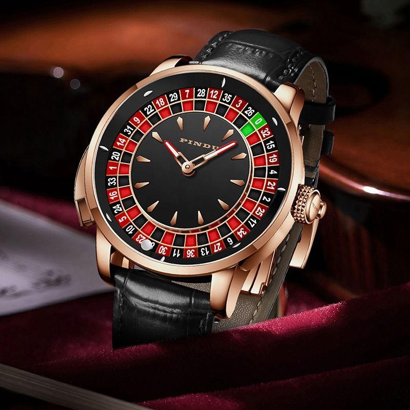 Luxury sport-inspired watch with roulette dial, rose gold case, black leather strap, bold design