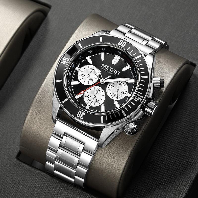 Motorsport-inspired stainless steel chronograph watch with black bezel and silver bracelet