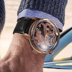 Luxury skeleton sport-inspired wristwatch with rose gold case and black leather strap