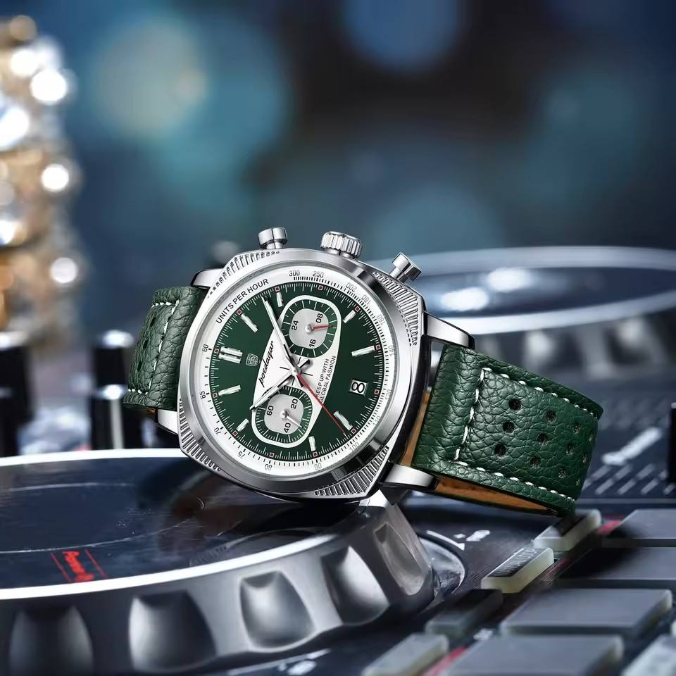 Green dial chronograph watch with perforated leather strap, motorsport-inspired luxury timepiece