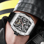 Motorsport-inspired skeleton watch with tonneau-shaped case, bold dial on wrist