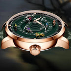 Luxury sport-inspired watch with racing motif, rose gold case, and miniature motorcycle racers on green dial.