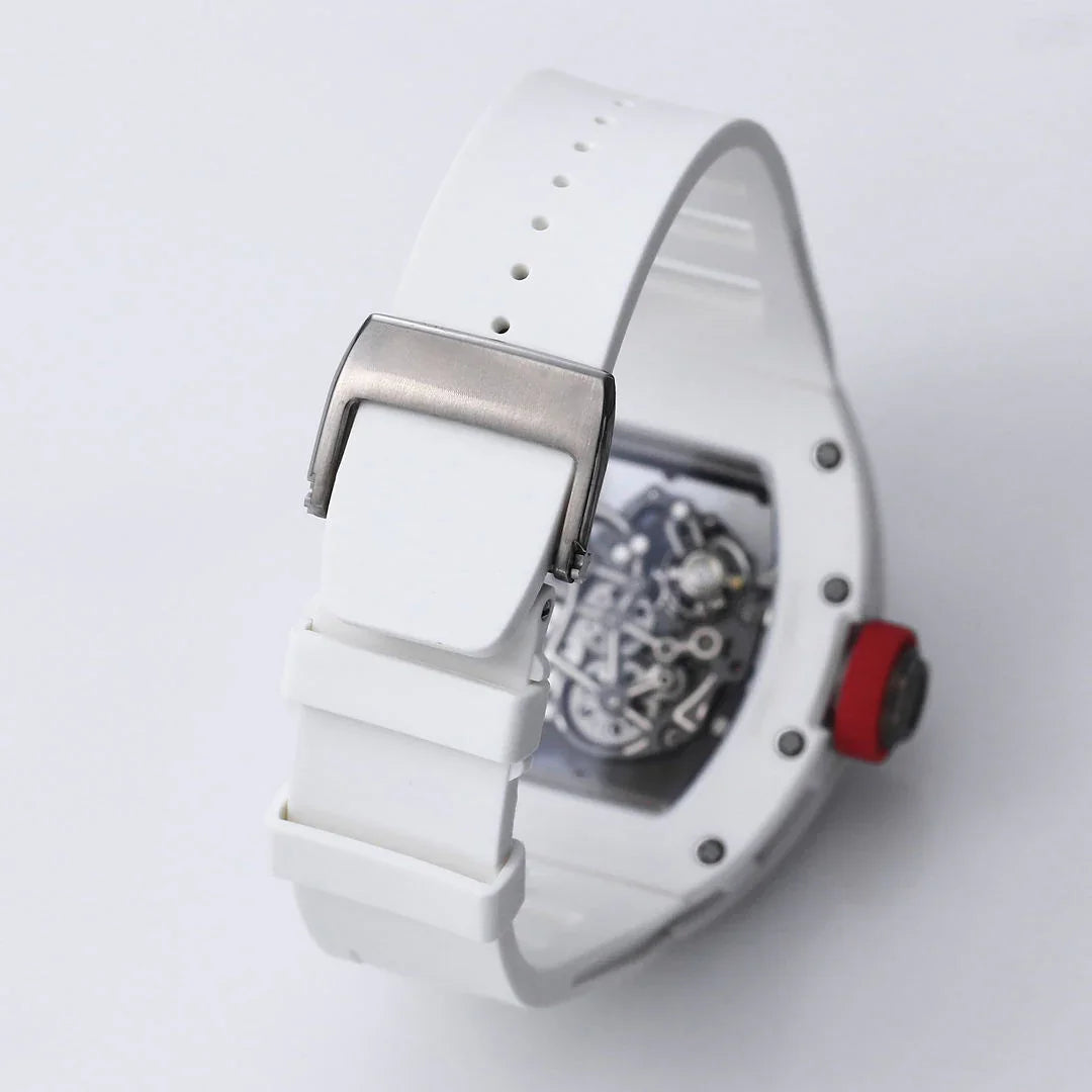 Skeleton dial racing-inspired watch with white band, metal clasp, red crown, and visible movement