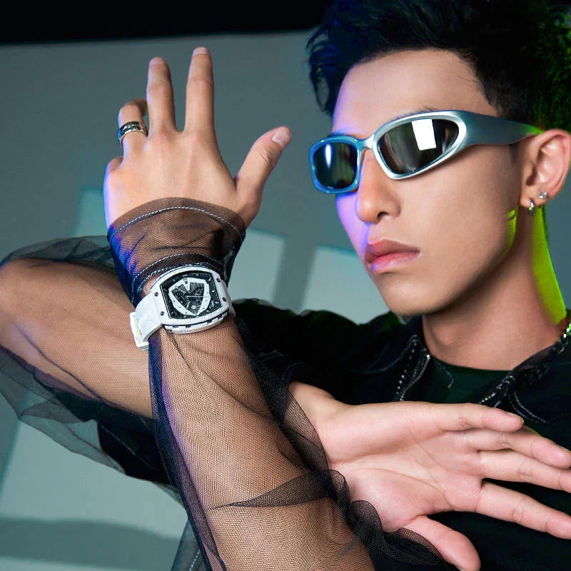 Man wearing futuristic sunglasses and a white motorsport-inspired luxury homage watch