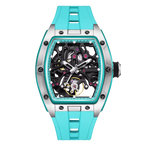 Luxury sport-inspired skeleton watch with turquoise strap, openwork dial, and steel case