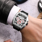 Luxury racing-inspired sport watch with bold silver case, multi-dial chronograph, black strap