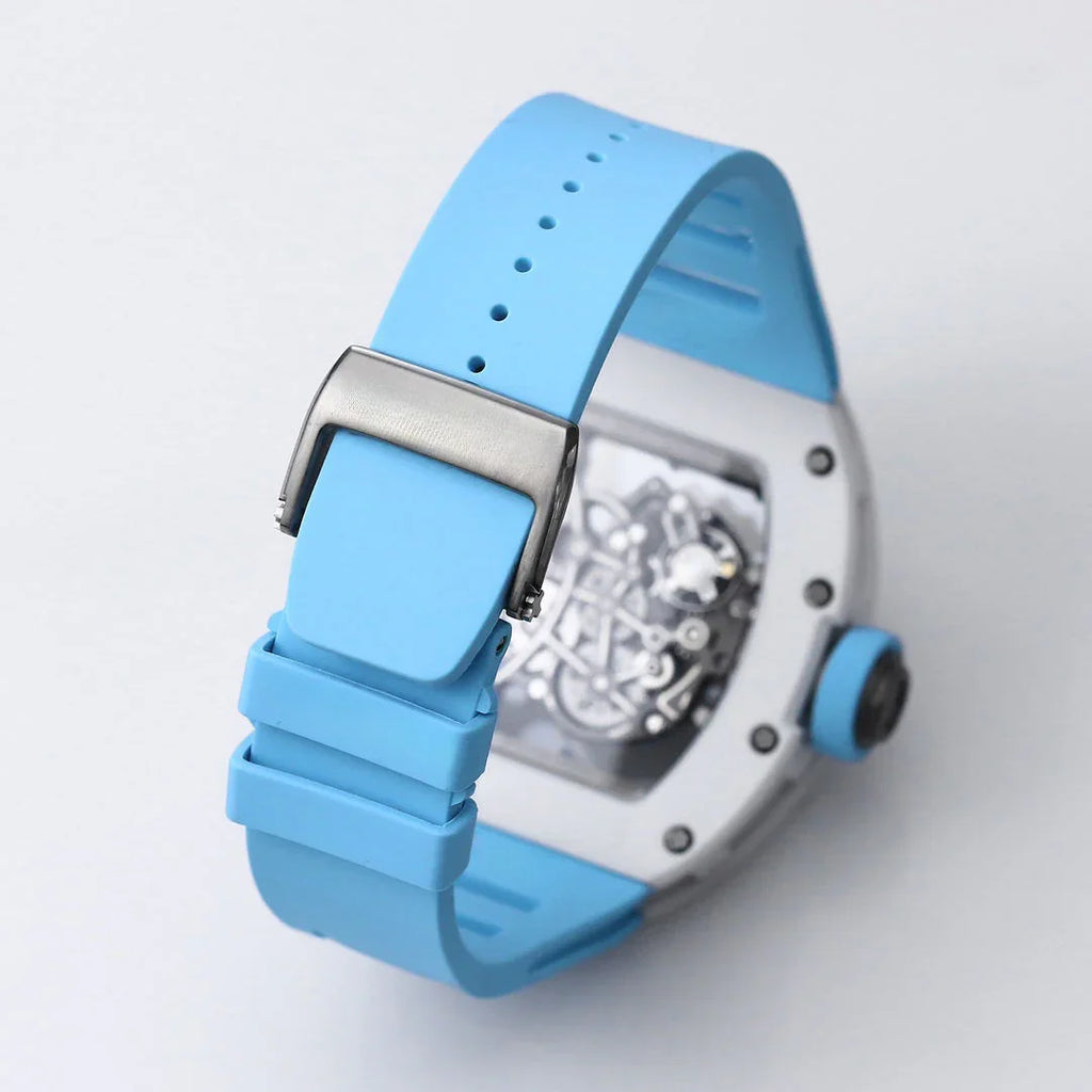 Luxury sport watch with light blue strap, skeleton back, inspired by motorsport design