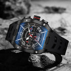 Luxury sport chronograph watch with black angular case, blue accents, and bold racing-inspired design