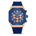 Blue and rose gold sport-luxury chronograph watch with bold octagonal face and rubber strap