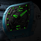 Motorsport-inspired luxury watch with blue case, skeleton dial, and green luminous markers