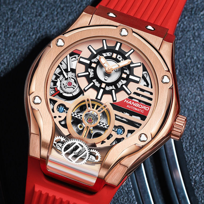 Luxury skeleton automatic watch with rose gold case, red rubber strap, and exposed gears, motorsport-inspired design