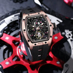 Luxury skeleton watch with rose gold case and black strap, racing-inspired design