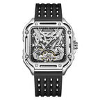 Skeleton dial sports watch with square silver case, black rubber strap, and visible mechanical movement.