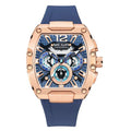 Luxury motorsport-inspired chronograph watch with rose gold case, textured blue dial, and blue strap