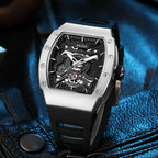 Luxury motorsport-inspired automatic watch with tonneau case, openwork dial, black strap